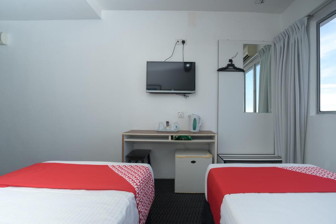 Capital O Ridel Hotel Кота-Бару Экстерьер фото