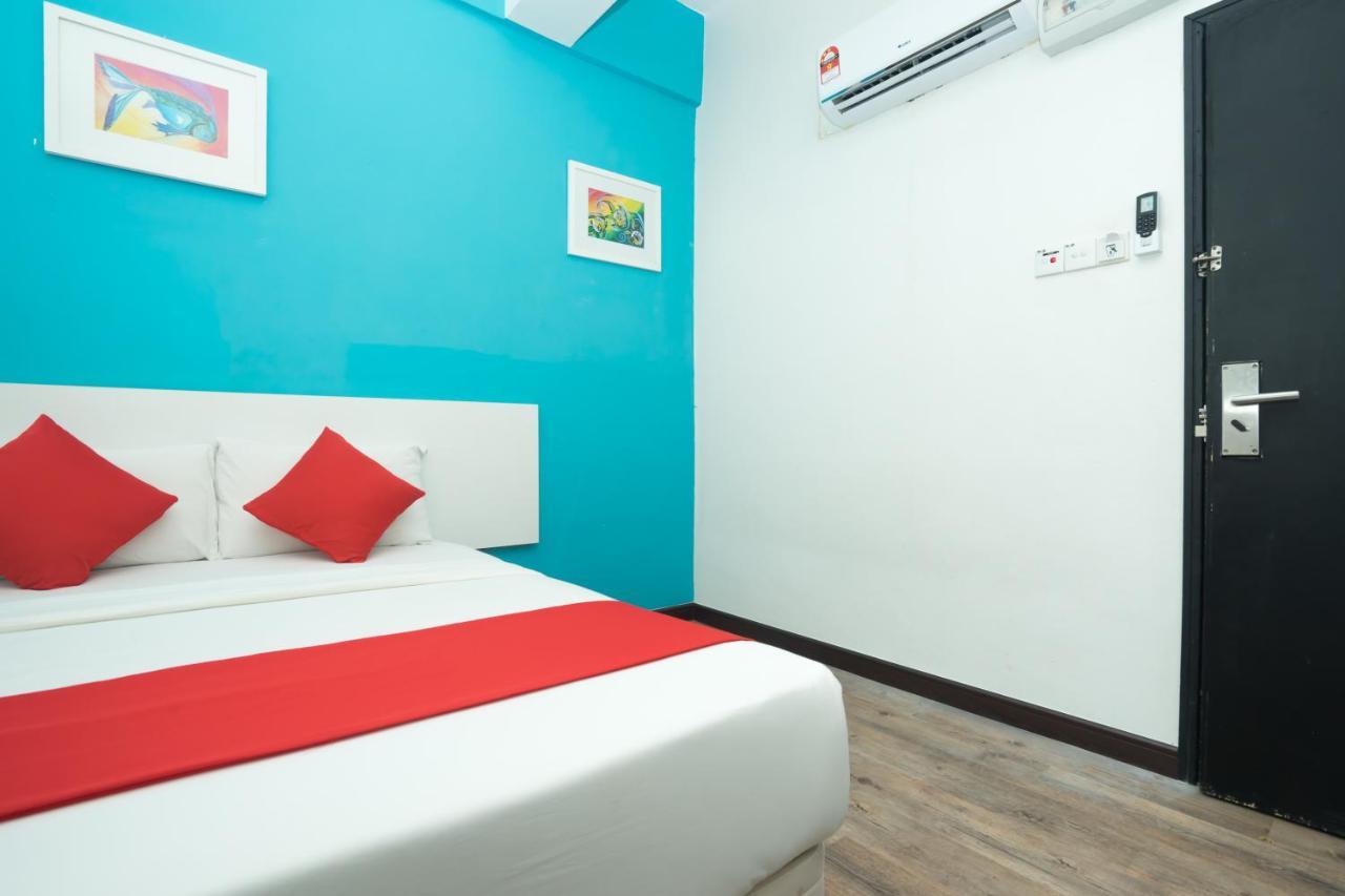 Capital O Ridel Hotel Кота-Бару Экстерьер фото