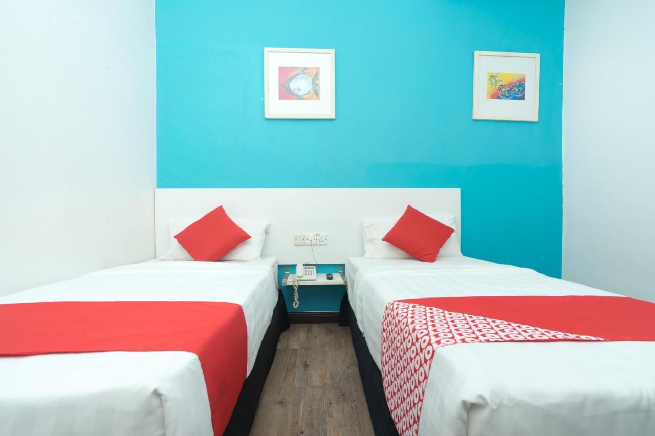 Capital O Ridel Hotel Кота-Бару Экстерьер фото